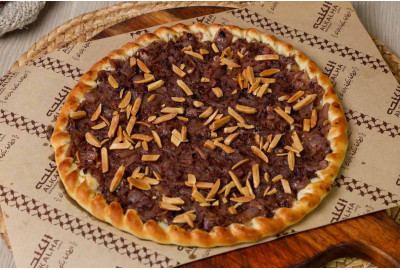 منقوشة مسخن بصل وسماق