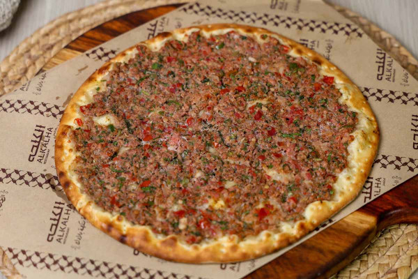 لحم بعجين - خضار / دبس رمان